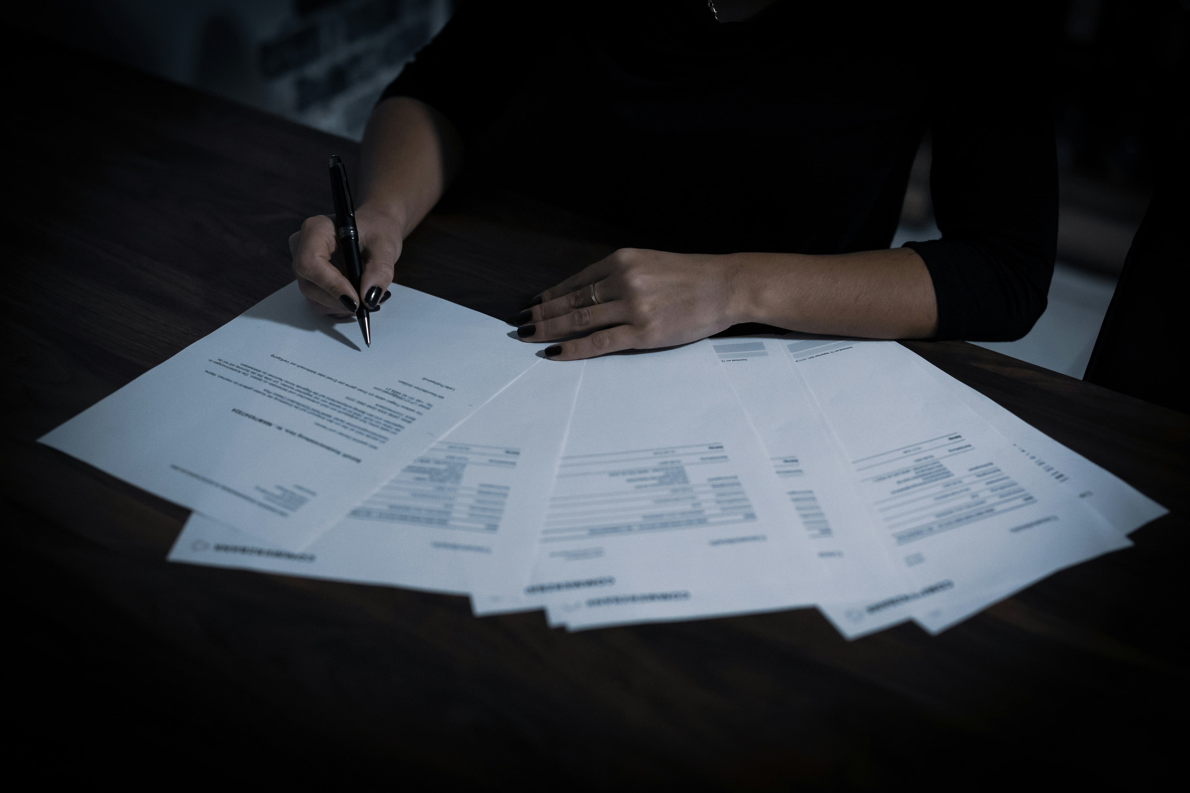 A manager reviewing documentation with a colleague
