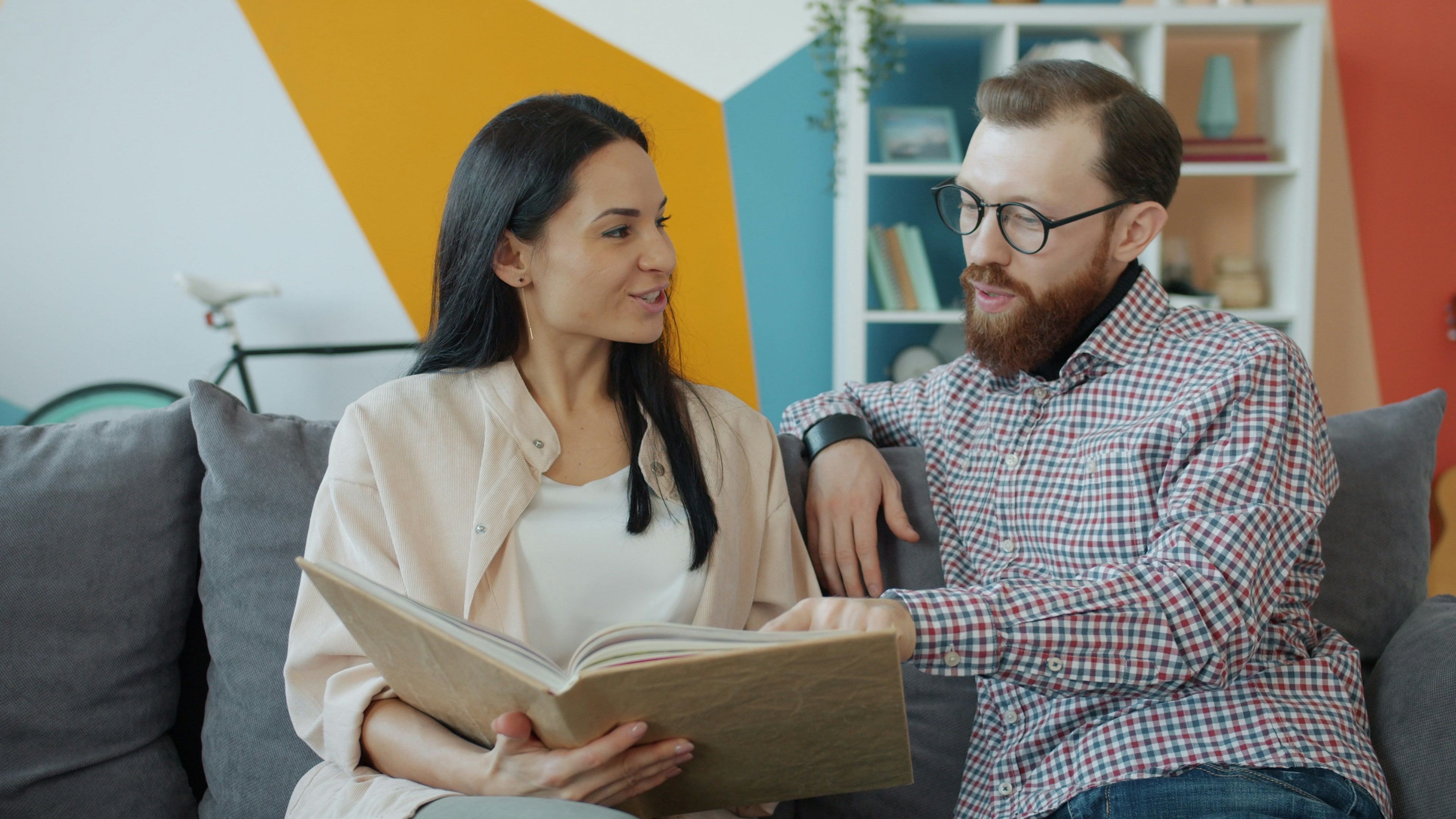 A family member and coordinator reviewing a CQC report together